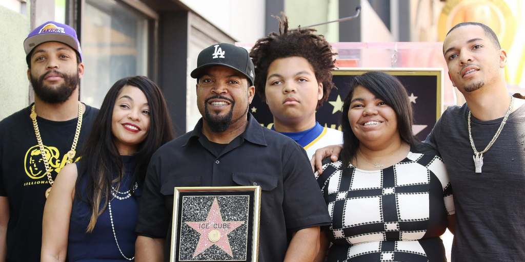 Ice Cube with his two daughters and three sons